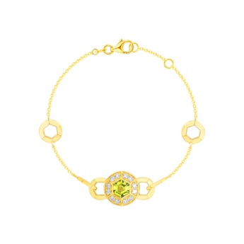 سوار كنزي بالذهب الأصفر 18 قيراطًا مزين بالبيريدوت الأخضر والألماس.